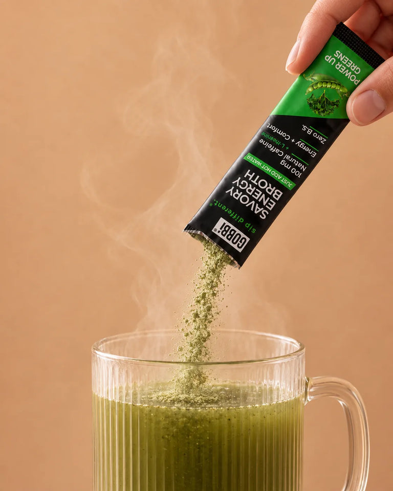 Power Up Greens Energy Broth's Stickpack pouring into a mug