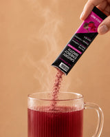 GOBBi Bold Beet Energy Broth stick pack pouring into hot water